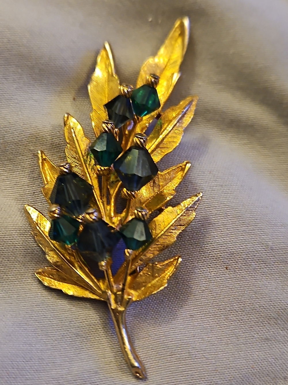 Gold-Tone Leaf Brooch with Dark Green Crystal Accents - Women's Jewelry